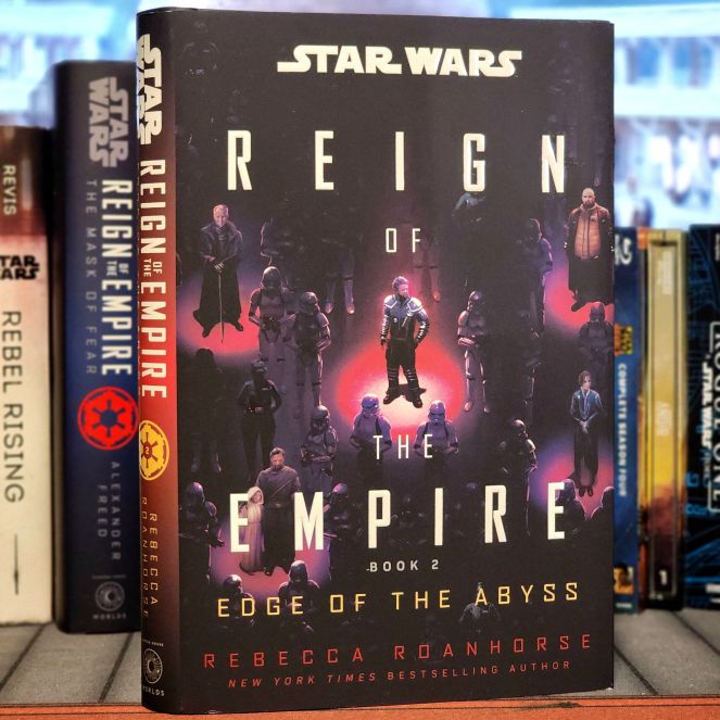 Book cover for 'Star Wars: Reign of the Empire - Edge of the Abyss' by Rebecca Roanhorse, featuring various characters from the Star Wars universe against a dark background.